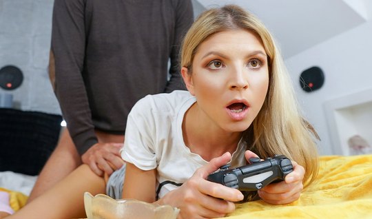 Russian gamer fucks doggystyle with her lover without looking up from the game...